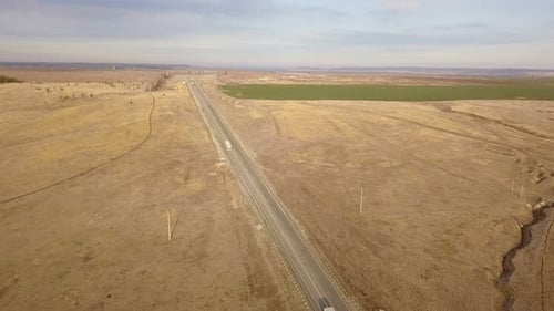 Trucks Driving on Rural Highway Aerial View