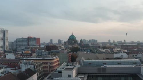 AERIAL: Over Rooftops of Berlin, Germany City Center in Fall Colors Towards Berlin Cathedral at