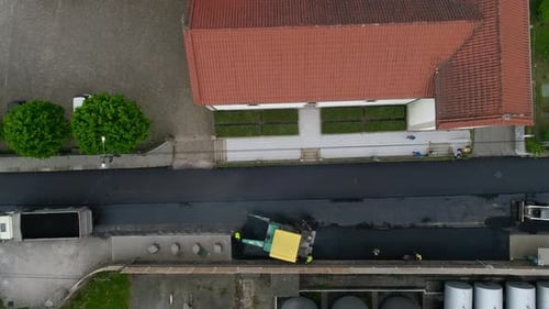Aerial View of Asphalt Paving on City Street