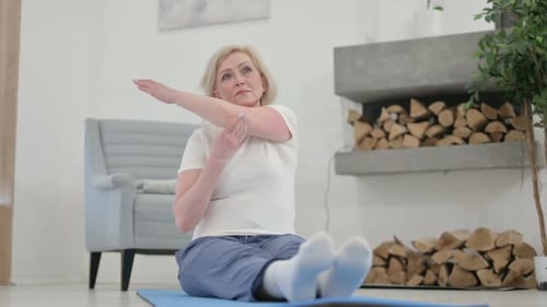 Woman Stretching Arms on Yoga Mat