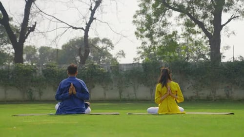Yoga Outdoors on Green Grass Field