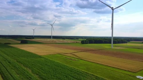 Wind Turbines in Green and Golden Rural Landscape