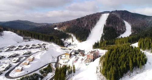 Aerial View of the Ski Resort in Mountains at Winter