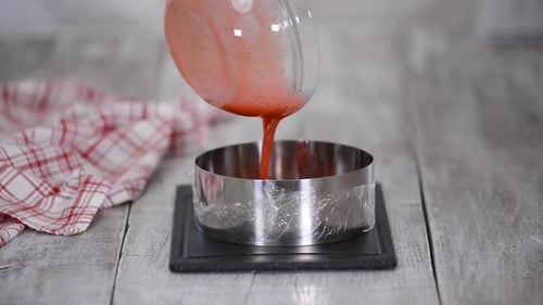 Making Dessert with Red Creamy Filling