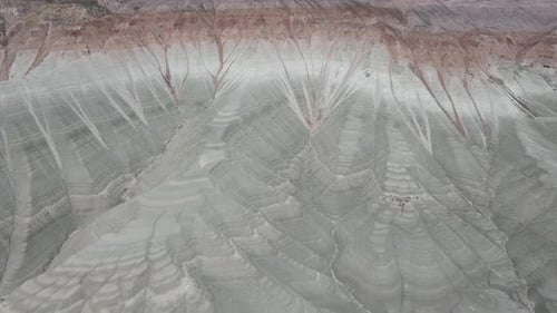 Textured Rock Formations in Arid Desert Landscape
