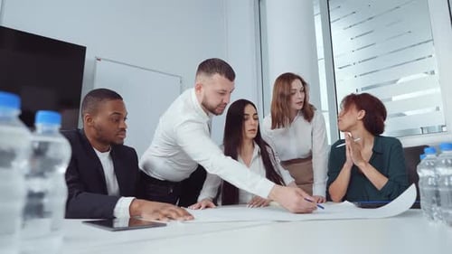 Diverse Team Collaborating in Bright Modern Office