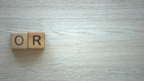 Spelling Organic with Blocks on Wooden Surface
