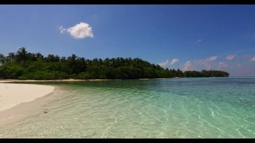 Aerial scenery of marine coastline beach break by blue water and white sand background of a dayout n