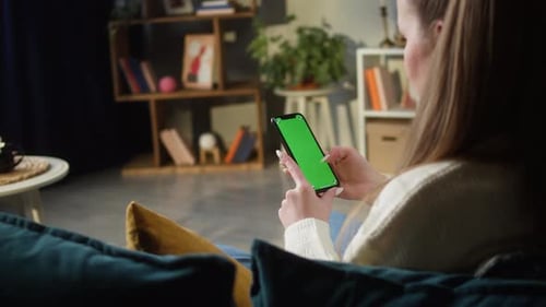 Woman Using Smartphone with Green Screen