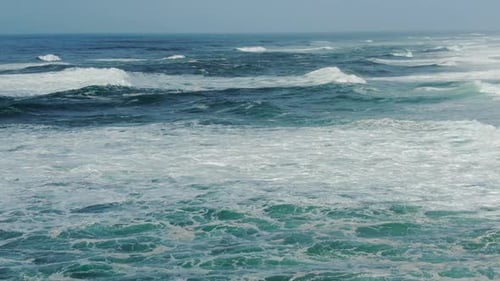 Picturesque Ocean with Rolling Waves on Sunny Day Upper View