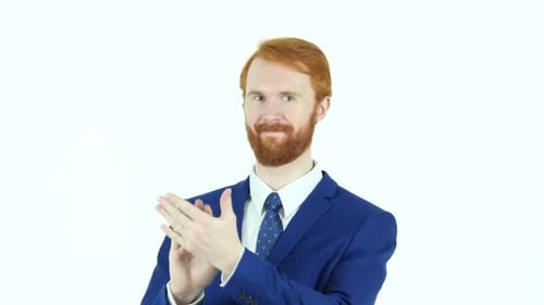 Man in Blue Suit Clapping Hands on White