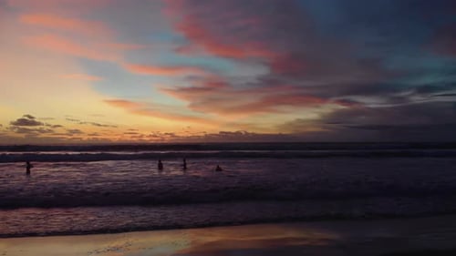 Flight at Sunset Overlooking the Indian Ocean in Bali Indonesia
