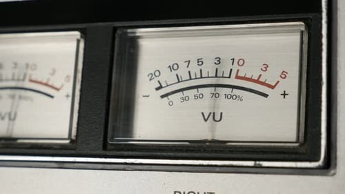 Close-up details of analog VU meter scale 4K 2160p 30fps UltraHD footage - Needles of standard volu