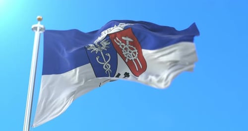 Realistic Flag Waving Animation with Coat of Arms against Blue Sky