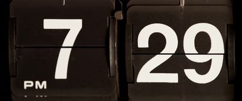 Flip Clock Displays Time Passing at Night