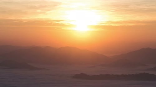 Majestic Sunrise Over Misty Mountains Time-Lapse