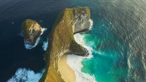 Kelingking Beach with Blue Sea at Nusa Penida Island, Bali, Indonesia, Aerial View