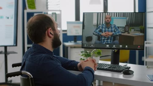 Two Adult Men Having a Virtual Meeting in Office