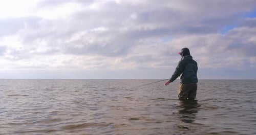 Fly Fishing For Sea Run Brown Trout Under Majestic Skies
