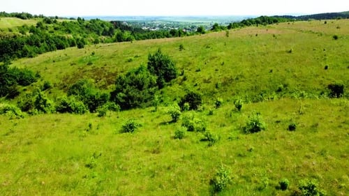 Aerial drone view of a flying over the rural agricultural landscape.