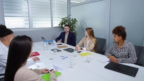 Business Team Brainstorming at Meeting in Office