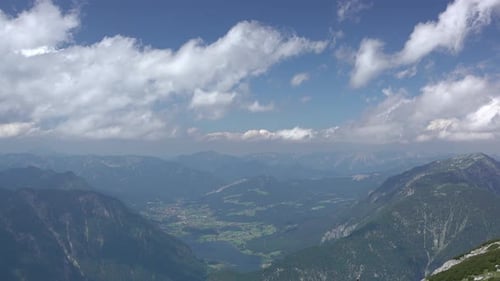 Sweeping Aerial View of Majestic Green Mountain Range