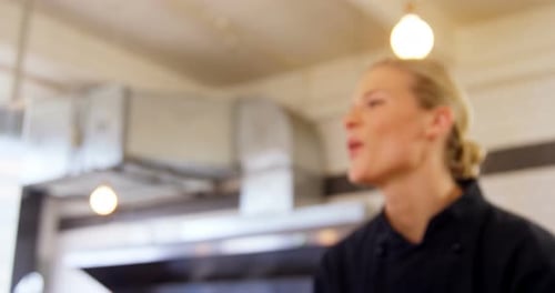Waitress ringing order bell at counter 4k