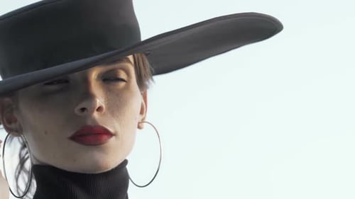 Woman in Stylish Hat Close Up
