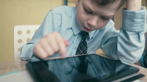 CU, Tracking: Pupil Works on a Tablet Computer, Does Lessons, Flips Through Pages