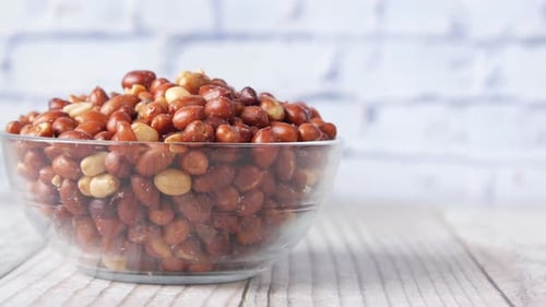 Processed Pea Nuts in a Bowl on Table Top Down