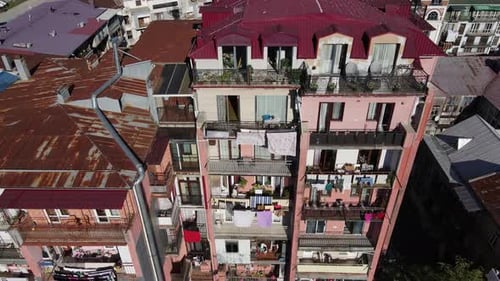 Old Residential Building with Rusty Roof in Batumi Drone Footage Georgia