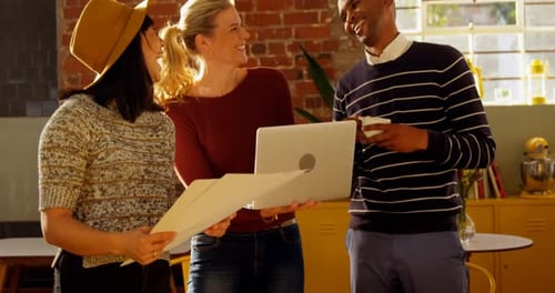 Smiling Team Working in Bright Urban Office