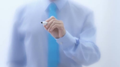 Writing the Word Idea on a Glass Surface