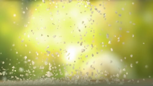 Salt Is Falling Down On A Wooden Cutting Board On A Green Background In High Speed Vh