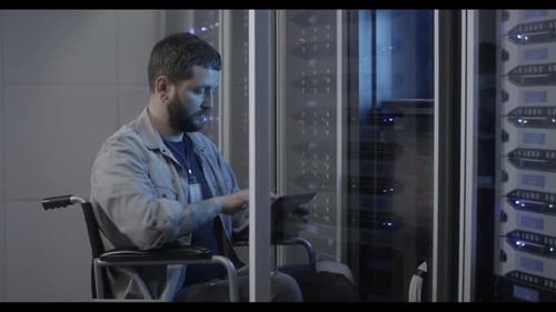 Technician Working in Data Center