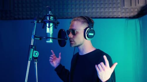 Male Rap Singer Sings Hip Hop in Microphone