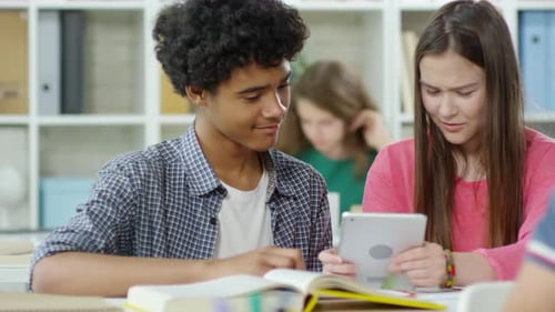 Two Pupils Using Tablet