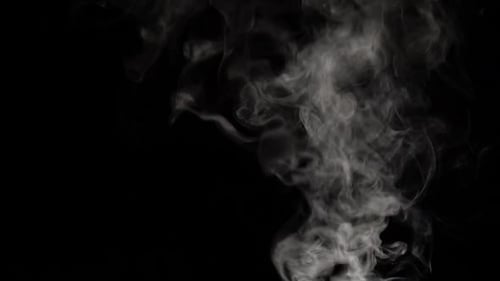 White Smoke Rising on Black Background