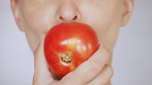 Close Up Face Young Woman Eating Vegetable