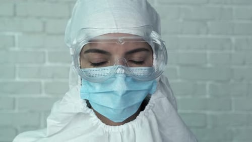 Portrait Female Doctor in Protective Kit Working in Lab. Close-up