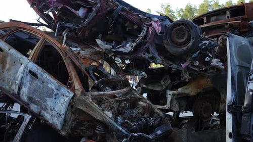 Crumpled Cars in War Zone in Ukraine Outdoors