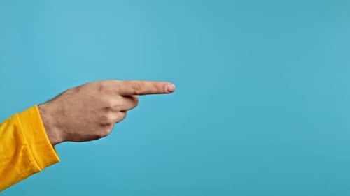 Hands of Man He Indicates with Finger on Right Side Copy Space