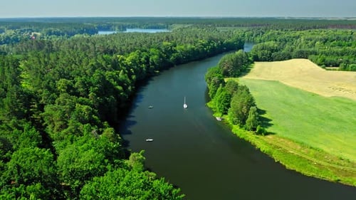 Boat on river. Sailing on river. Sport in summer nature