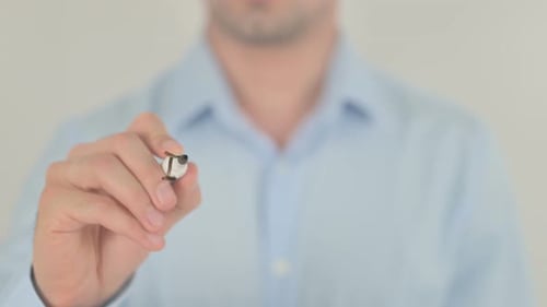 Arm Writes Word Inspiration With Marker