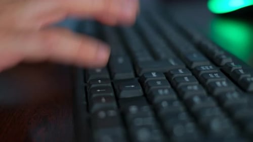 Closeup Video Male Hand Typing Text on Keyboard