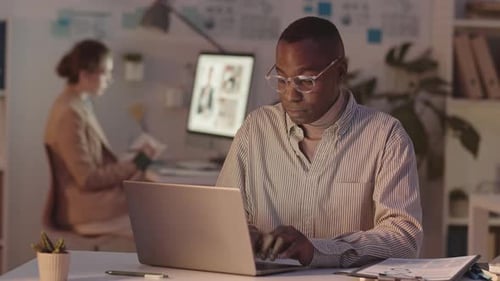 African-American Man Working Late in Office