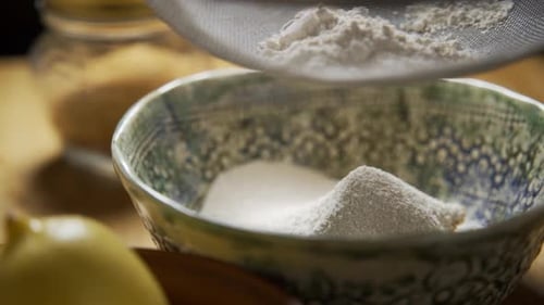 Sifting Flour into Bowl for Baking