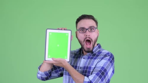 Man Holding Tablet With Green Screen