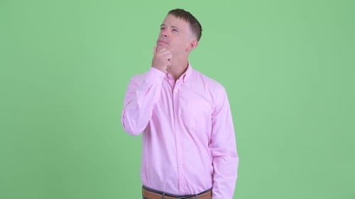 Man Thinking with Finger on Chin on Green