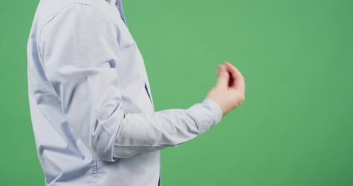 Side view of a hand gesturing "what do you want" sign